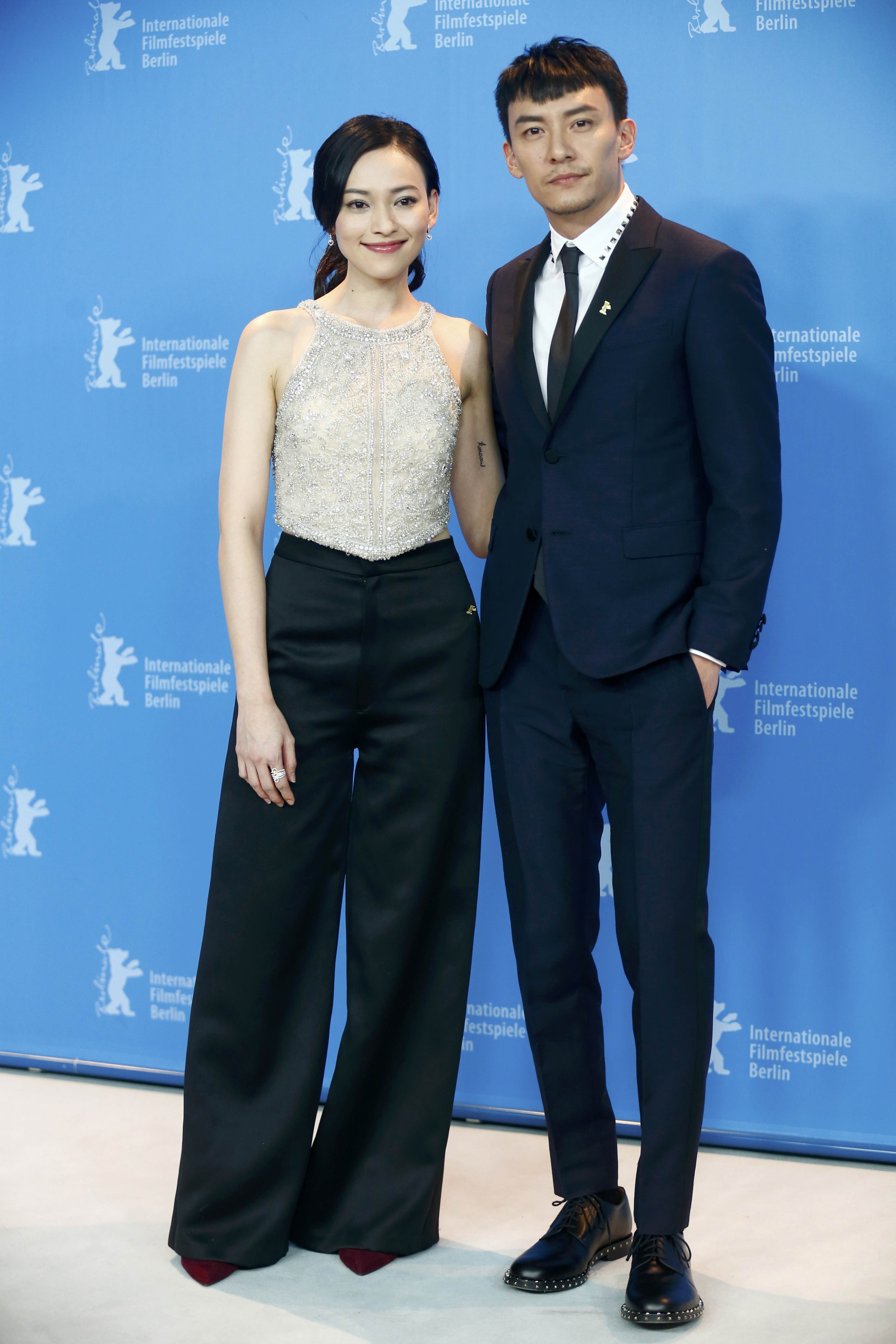 Actress Yiti Yao and actor Chen Chang pose during a photocall to promote the movie 'Mr. Long' at the 67th Berlinale International Film Festival in Berlin