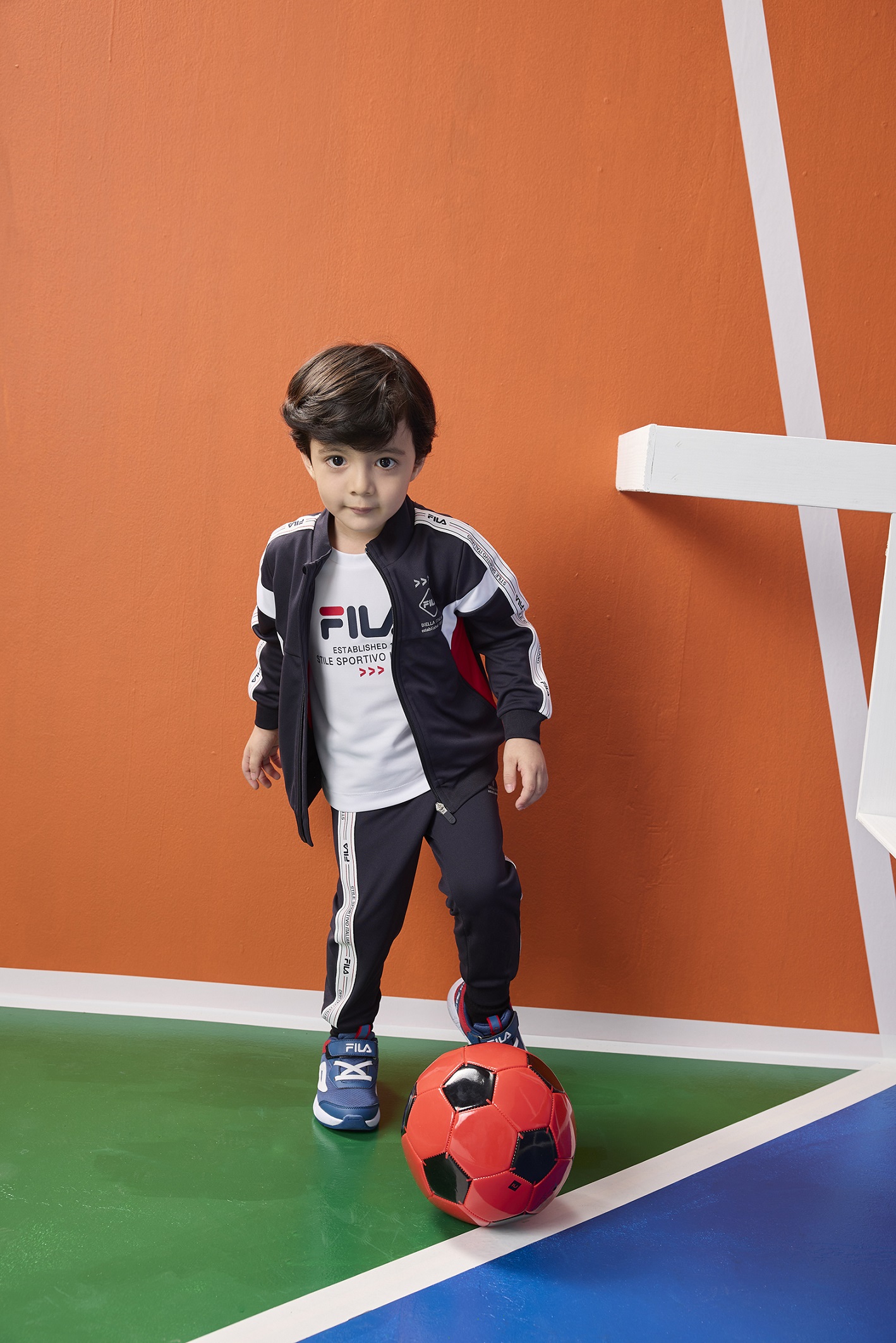 FILA為孩童打造專屬運動套裝，滿足各種運動項目需求。（FILA提供）